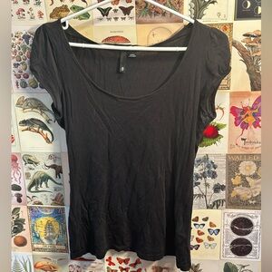 H&m black tshirt, slight puff sleeve Size 8. Good condition. Basic tee